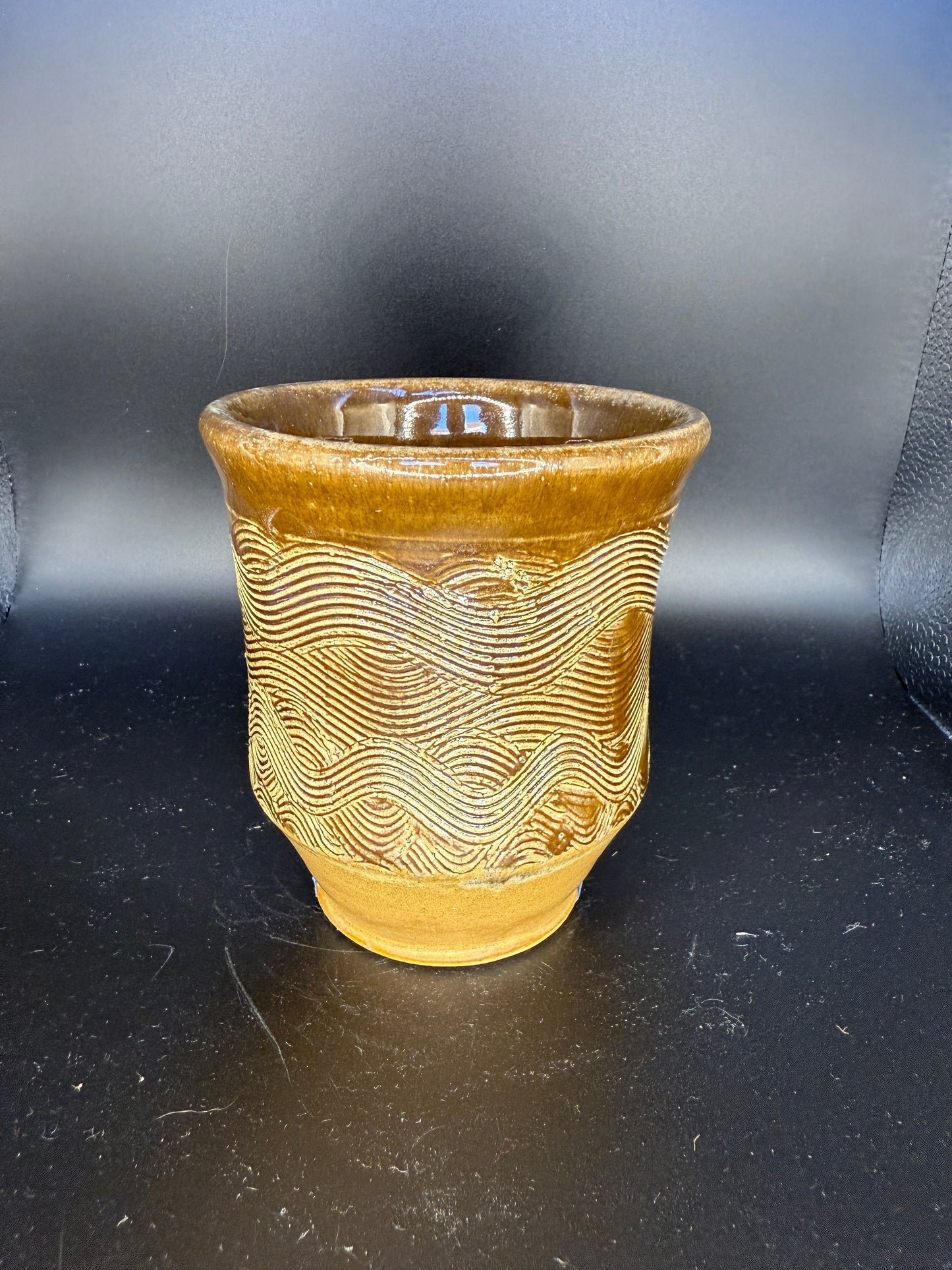 Handmade Brown Ceramic Cup with Wave-Inspired Ripple Design – Unique & Artistic