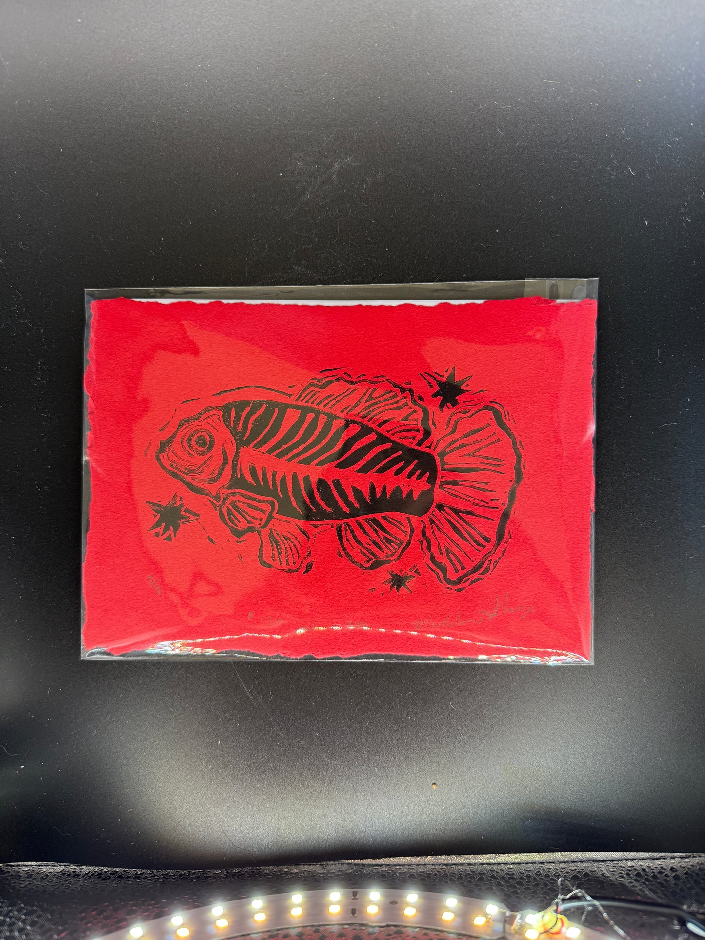 Red and Black Fish Skeleton Linocut Print – Bold Handmade Art Piece