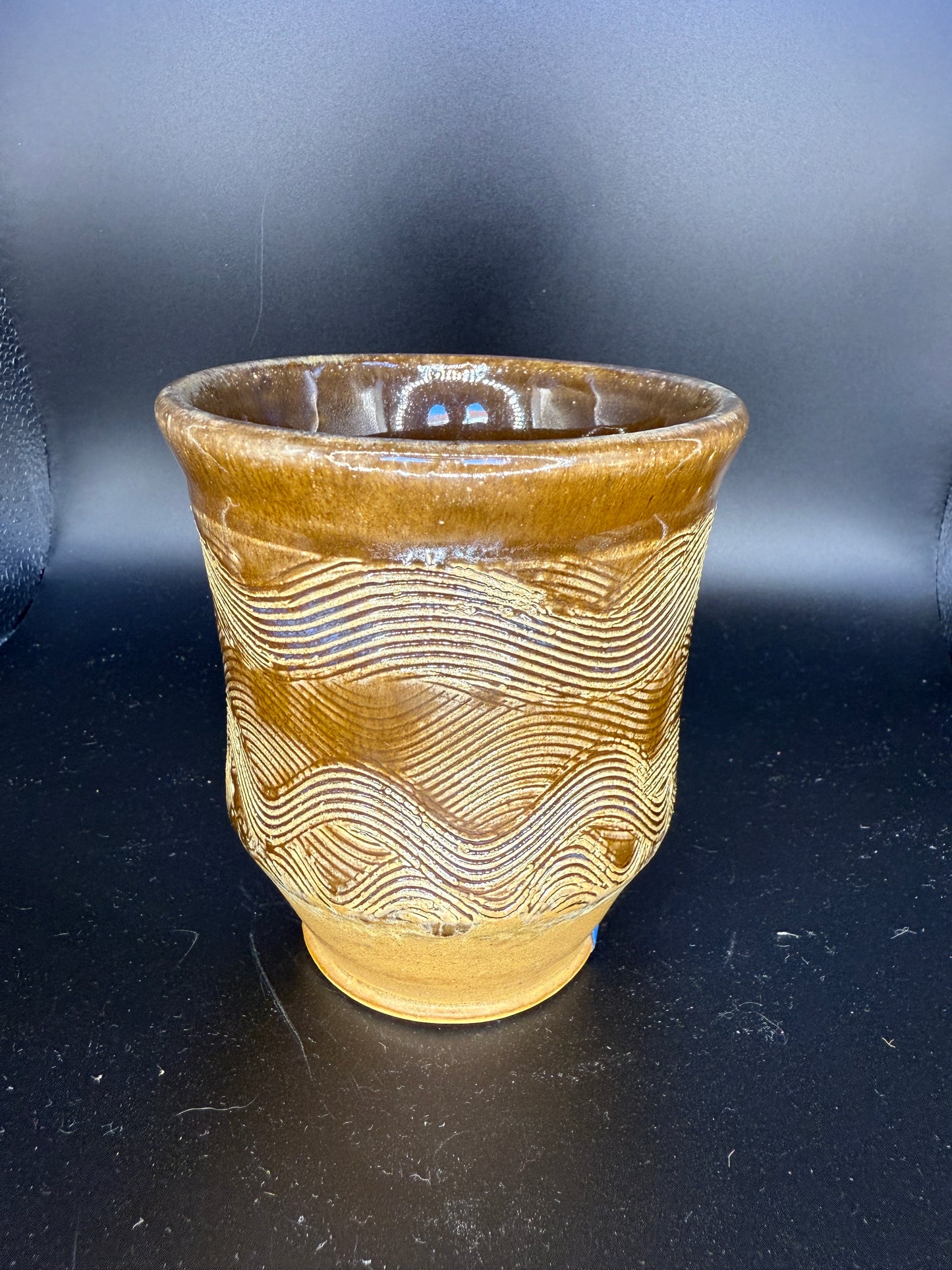 Handmade Brown Ceramic Cup with Wave-Inspired Ripple Design – Unique & Artistic